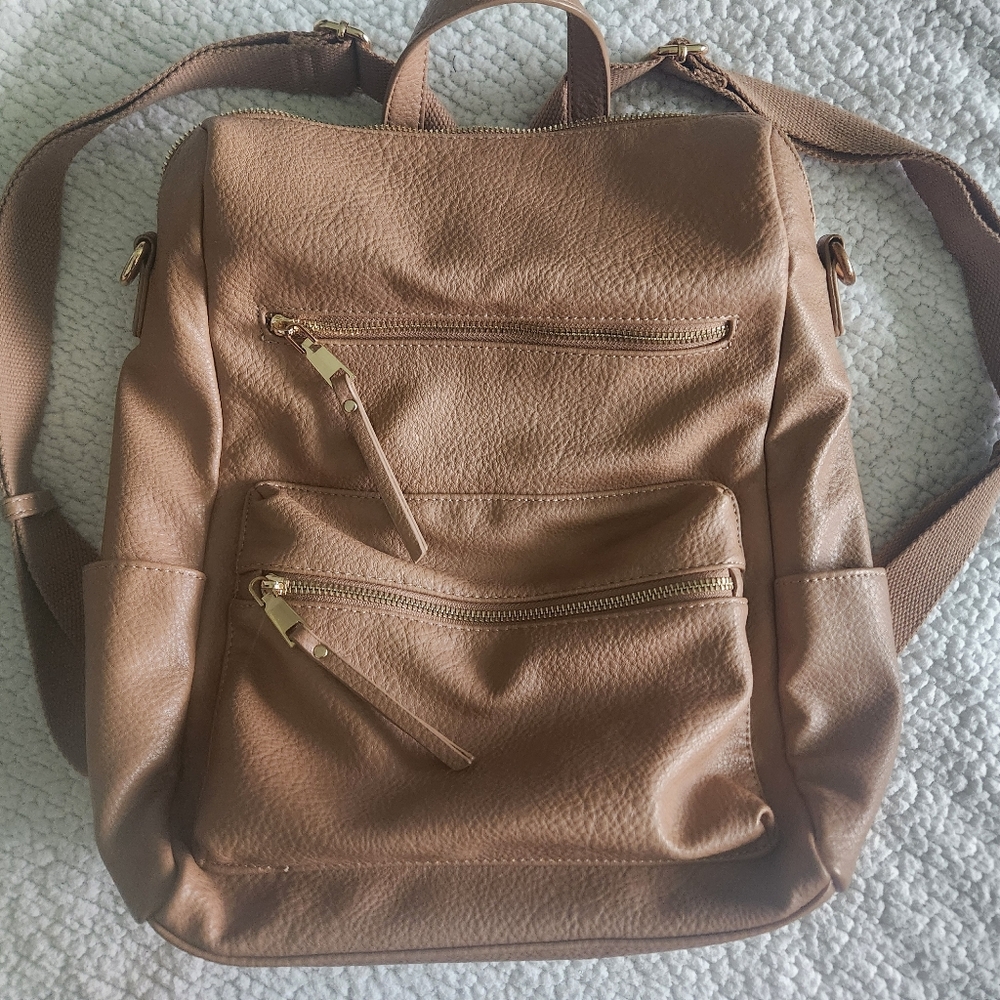 Vintage brown colored convertible backpack purse
